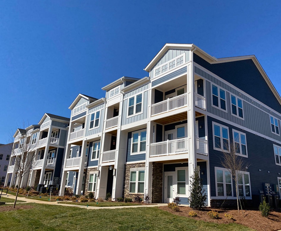Tryon Farms apartment exterior with newly landscaped grounds